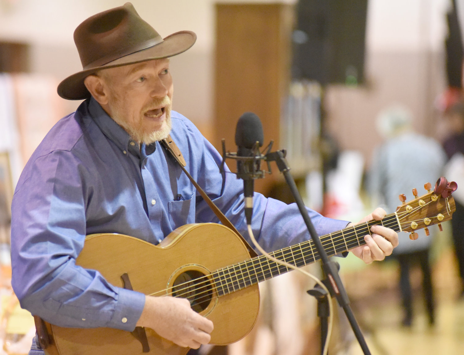 Mark Wilson sings prior to the start of the auction on Friday evening at the Pleasantview Benefit Sale.